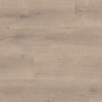 licht beige eiken vloer met brede planken en subtiele houtnerfstructuur met hier en daar noesten zichtbaar