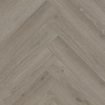 lichte grijs beige vloer met visgraatpatroon en subtiele houtstructuur met kleine noesten en fijne houtnerven