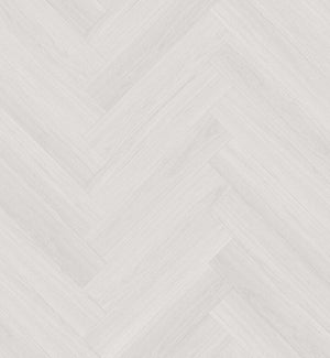 lichte white wash visgraatvloer met subtiele houtstructuur en smalle brede planken