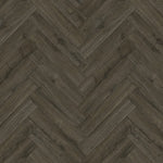 donker grijs bruin vloer in visgraatpatroon met subtiele houtstructuur en matte afwerking