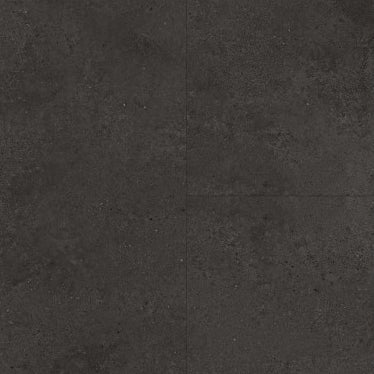 donkergrijze tegelvloer met grote tegels in een matte, lichtkorrelige structuur en subtiel vlekkerig patroon