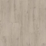 lichte eiken vloer met een subtiele houtstructuur en natuurlijke noesten, brede planken en een matte afwerking