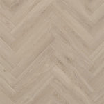 lichte beige eiken visgraatvloer met een fijn natuurlijke houtstructuur en subtiele noesten