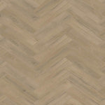 licht beige eiken visgraatvloer met een subtiele houtnerfstructuur en matte afwerking