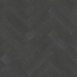 donkergrijs vloer met visgraat patroon en een matte, subtiele steenstructuur
