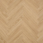 Licht eiken visgraatvloer met een fijne houtstructuur en warme beige tinten.