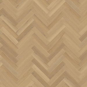 licht beige eiken vloer met visgraat patroon en subtiele houtstructuur