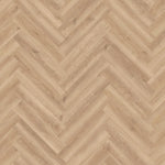 licht eiken visgraatvloer met natuurlijke houtstructuur en subtiele noesten in brede planken met een matte afwerking
